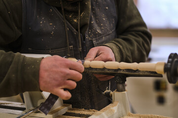 Woodwork and furniture making. Joinery, woodworking and furniture making, professional carpenter cutting wood in carpentry shop, industrial concept