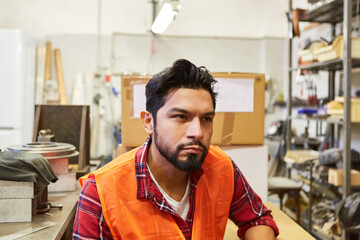 Young man as warehouse worker or order picker