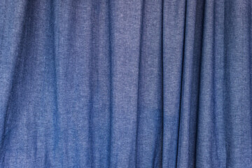 A blue fabric texture using for a background.