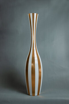 Decorative vases on a gray background.
