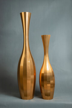 Decorative vases on a gray background.