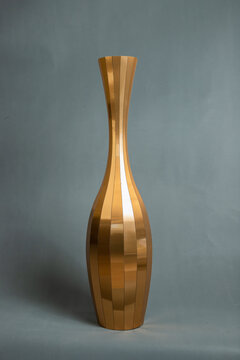 Decorative vases on a gray background.
