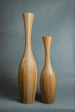 Decorative vases on a gray background.