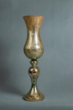 Decorative vases on a gray background.