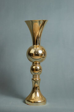 Decorative vases on a gray background.