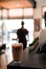 iced coffee on the table inside cafe