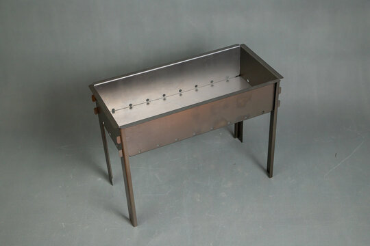 Not a large collapsible barbecue on a gray background.