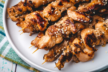 Grilled Asian Chicken Barbecue (BBQ)  seasoned with seasoned with sesame seeds 