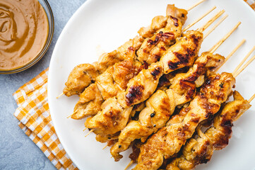 Famous Asian Chicken Dish- Chicken Satay with Peanut Sauce on the side- topview