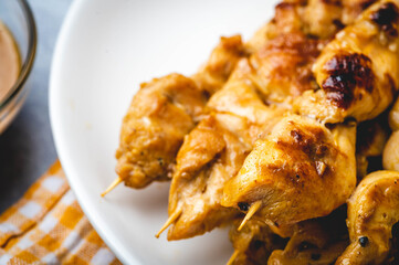 Famous Asian Chicken Dish- Chicken Satay with Peanut Sauce focused