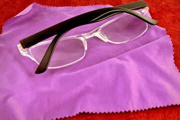 glasses for vision on a soft napkin