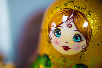 A traditional Russian toy, Matryoshka, bright babushka doll, stacking doll, nesting doll with a...