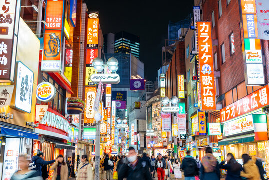 Tokyo, Japan - January 6, 2016: A busy shopping street in the Shinjuku district, Tokyo, Japan