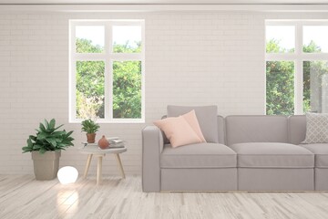 White living room with sofa and summer landscape in window. Scandinavian interior design. 3D illustration