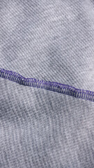 Pespunte de hilo morado de costura interna de chaqueta con forro de algodón