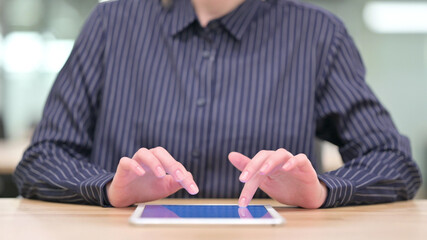 Close up of Businesswoman using Tablet