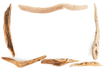 Frame made of driftwood piecies isolated on white