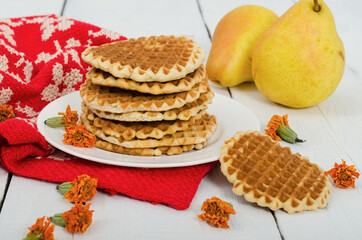 Waffles on a plate with pears