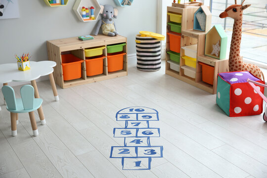 Blue Hopscotch Floor Sticker In Playing Room