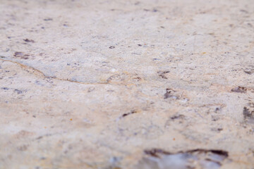 Dolomite natural stone texture. Stone with beige pattern on a smooth surface.