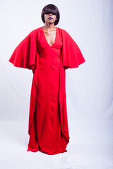 Beautiful African fashion model dressed in red gown