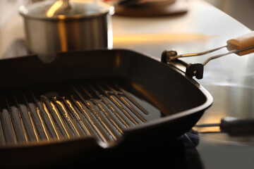 Frying pan with cooking oil on stove