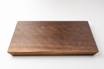 Wooden chopping board on white background