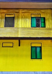 yellow window on the wall
