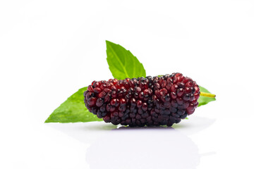 Ripe and delicious black mulberry on white background. 