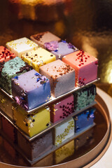 Beautiful decorated colorful dessert cube cake 