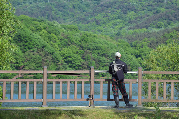 Filmed back appearance an Korean angler.