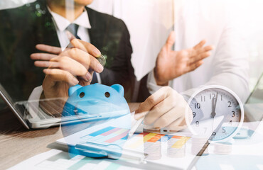 Fototapeta premium Business women reading document on office with tablet and graph financial diagram.Teamwork workplace strategy Concept.