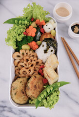 Healthy homemade food packed in lunch box / Penguin Onigiri with Japanese Curry & Side Dishes Bento / Handy for working people, outings or picnic