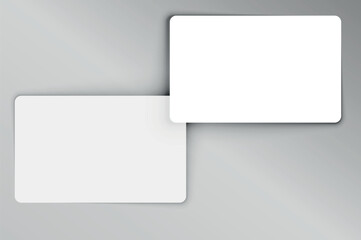 Two realistic blank plastic credit cards with shadow. Vector illustration.