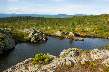 Fototapeta na wymiar Landscapes of the Murmansk region. View from the Volosyanaya mountain, Kandalaksha, Russia.
