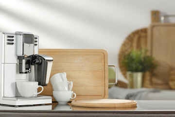 Fototapeta na wymiar White cooffee machine in kitchen and free space for your decoration. 