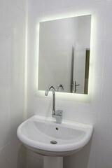 Interior design of bathroom sink in luxury apartment