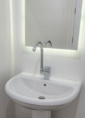 Interior design of bathroom sink in luxury apartment