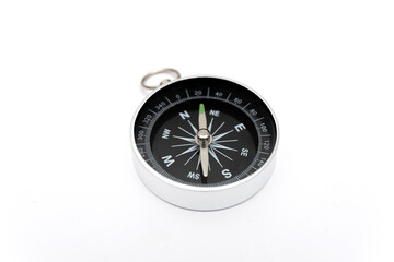 Compass close-up isolated on white background.