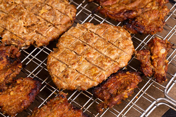 pieces of fried meat in breadcrumbs, served with greenery