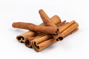 dry cinnamon sticks isolated on white background, macro