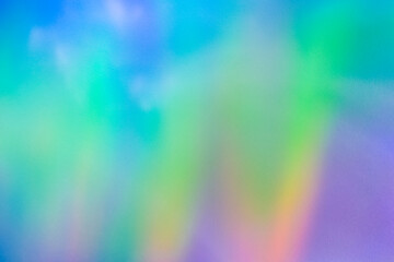 Blurred rainbow light refraction texture overlay effect for photo and mockups. Organic holographic...