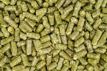 Alfalfa pellet. Food background