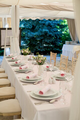 Wedding table set up design in white and pink