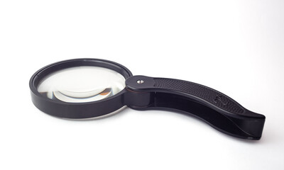 Magnifying glass on white background closeup, isolated