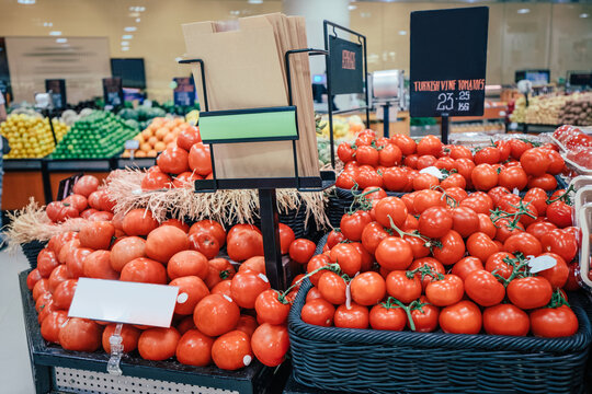 Fresh and tasty turkish vine organic tomatoes without GMO and pesticides on supermarket shelves in the grocery department
