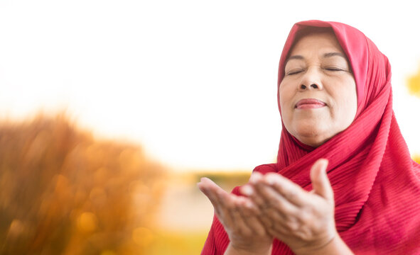 50-60 Years Old Senior Woman Muslim Pray.old Muslim Woman Wearing Hijab.Prayer Muslim Woman With Faith.Religious Muslim Praying Inside The Mosque.prayer Worship Allah. Ramadan Kareem Day.hope, Hajj.