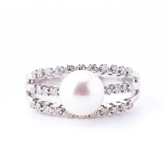 Diamond ring on white scene