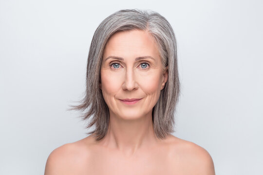 Photo of lovely old woman calm peaceful face mood flawless skin cosmetology isolated on grey color background