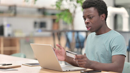 Fototapeta premium Online Shopping, Online Payment Failure for Young African Man